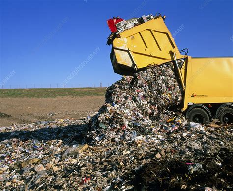 Landfill Site With Waste Truck Dumping Refuse Stock Image E Science Photo Library