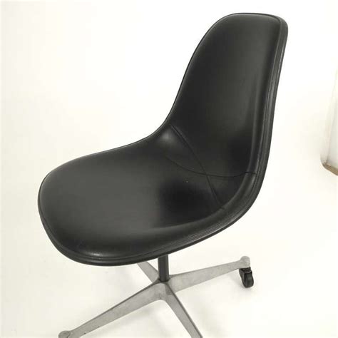 Today's modern information workers don't sit on gilded chairs. Vintage Eames Shell Chair for Herman Miller at 1stdibs
