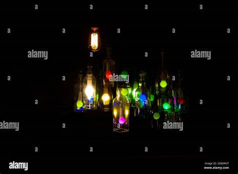 Coloured Lights Inside The Wine Bottle Hanging Stock Photo Alamy
