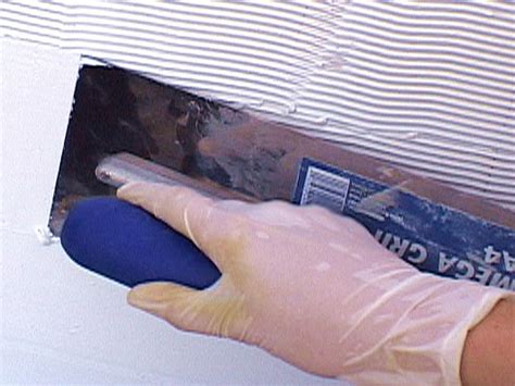 A tin tile backsplash is a great interior decorating technique that can transform a drab and boring wall space into something truly impressive. How to Install a Glass Tile Backsplash | how-tos | DIY