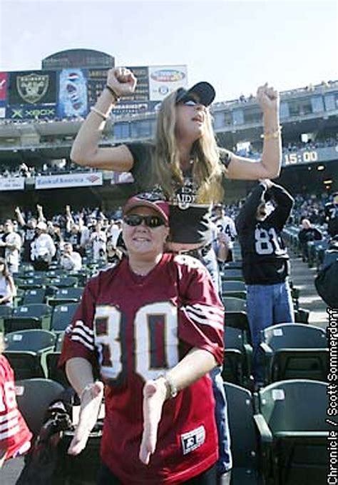 Raiders Fans See Red 49ers Faithful Survive Trek Into The Black Hole