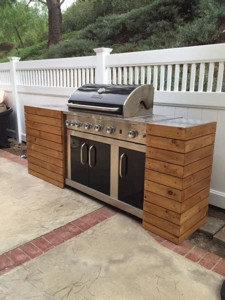 A nice fixed cabinet outdoor kitchen setup with a gmg pellet grill and a weber gas grill. Ana White | Barbecue/BBQ Quick Built-in - DIY Projects