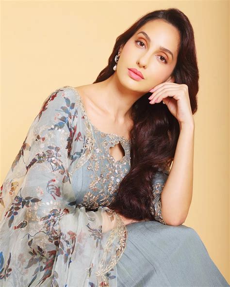 Nora fatehi pairs orange versace blazer worth 1.2 lakhs with shimmery pants and ysl bag worth rs. Dancing Beauty Nora Fatehi Images - Will make you fall in ...