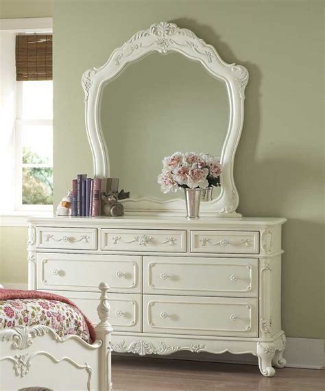 The victorian styling incorporates floral motif hardware creamy white finish and traditional carving details that will create the feeling of a room worth of a fairy tale princess. Homelegance Cinderella Bedroom Collection - Ecru B1386 at ...