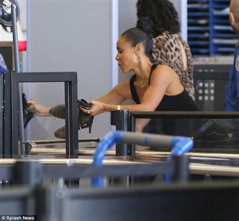 jada pinkett smith shows off her body as she heads through security at lax daily mail online