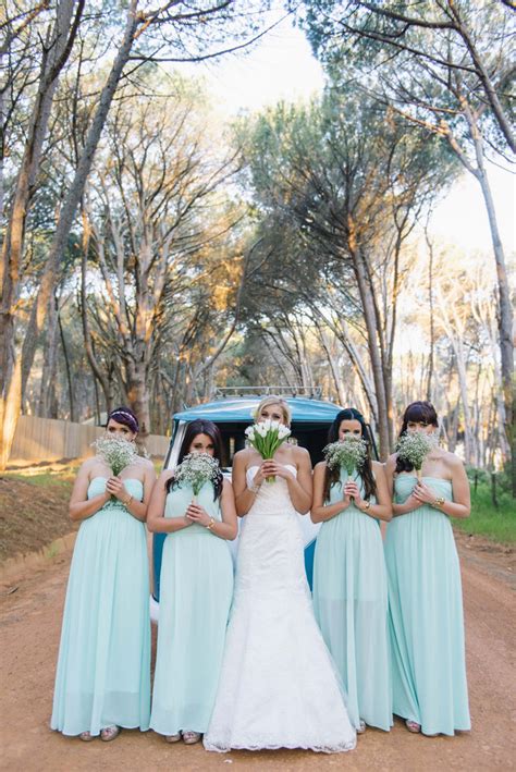 Pair your black wedding gown with pops of color through jewelry, a lace covered sash, or pair with a dyeable shoe to match your bridesmaids' dresses. White & Gold DIY Chevron Wedding {Claire Thomson Photography}
