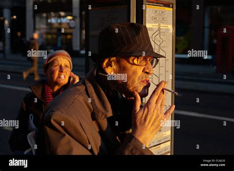 Old Man Smoking London Stock Photo Alamy