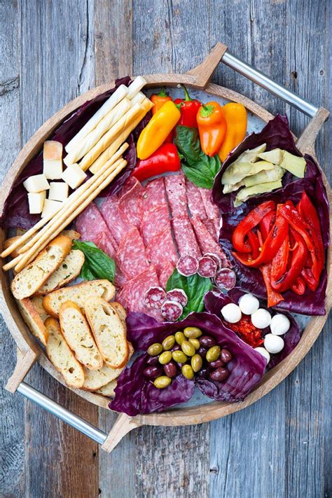 From fresh veggies to marinated fetta to creamy hommus, it has it all. Antipasto Platter Recipe | The Kitchen Magpie in 2019 ...