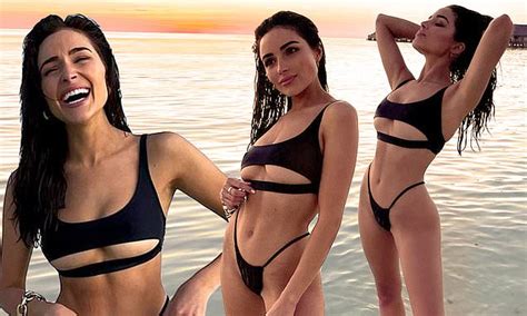 Olivia Culpo Puts Her Washboard Abs On Display In A Black Bikini At Sunset Daily Mail Online