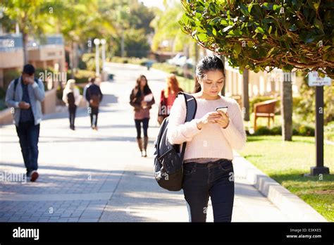 Students Walking Outdoors On University Campus Stock Photo Alamy