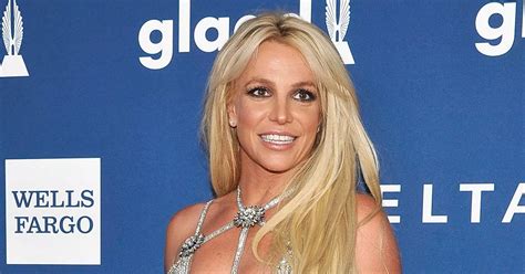 Britney Spears Flashes Sheer Bra Under Plunging Red Bodysuit In Racy