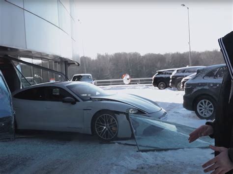 Russian Youtuber Crashes Porsche Taycan Through Dealership Window