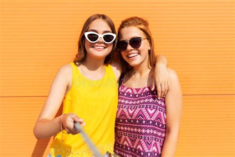 Teenage Girls Taking Selfie Outdoors In Summer Stock Photo Image Of