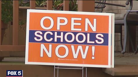 Dozens of 'Open Schools Now' signs stolen, trashed in Arlington