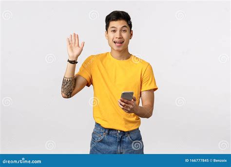 Guy Waving Raised Hand In Hello Its Me Or Greeting Gesture And