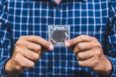 Male Hand Holding Condom Safe Sex Concept Stock Image Image Of Male Prevention 148115721