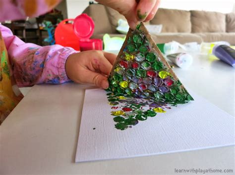 Writing christmas cards activity description. Learn with Play at Home: Simple Bubblewrap Christmas Cards made by kids