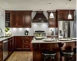 Trying to bring some new life to our blah tuscan kitchen. Cherry Cabinets Kitchen | Houzz