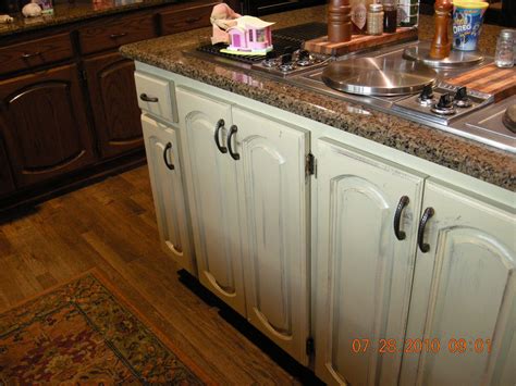 Kitchen paint colors with oak cabinets and stainless steel. The Island Was painted with a cream white then distressed ...