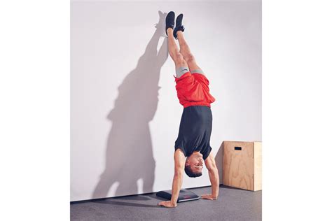 The Exercise Progressions Thatll Help You Nail Handstand Pushups Men