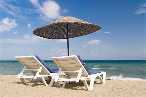 Beach Chairs And Umbrella On Tropical Beach Stock Image Image Of