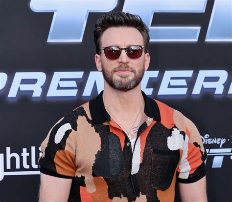 Chris Evans Poses Awkwardly With Mickey Mouse At Disneyland
