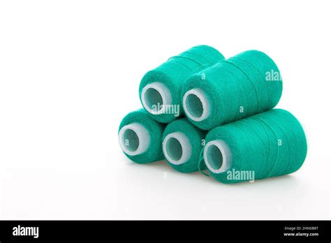 Green Spool Of Thread Isolated On White Background Skein Of Woolen