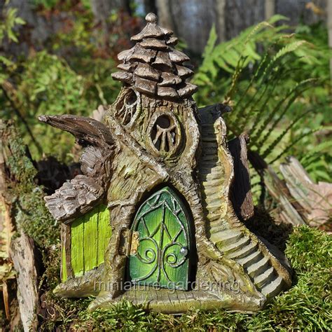 A complete the sentences with the correct word in the proper form. Miniature Merlin's Manor Fairy House for Miniature Garden ...