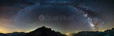 The Milky Way Arch Starry Sky On The Alps Massif Stock Photo 1030288