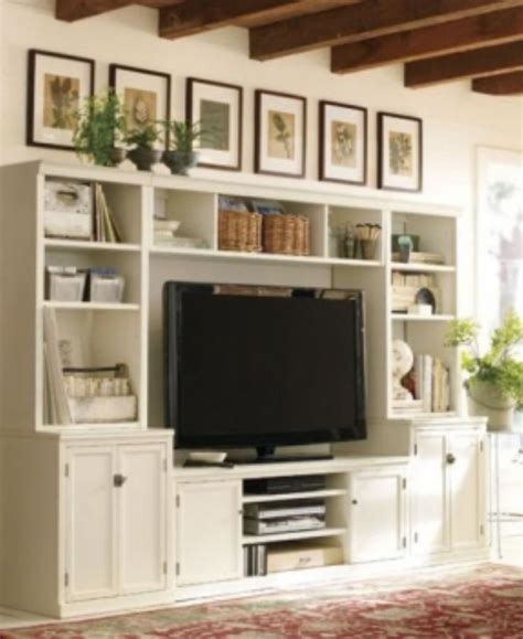 For items like end tables, entertainment centers, and coffee tables, white is key. Home entertainment centers ideas for anyone who loves ...