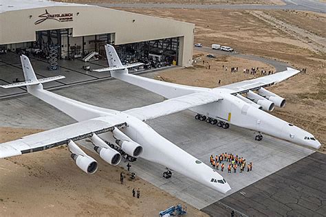 Paul Allen Rolls Out Stratolaunch Worlds Largest Airplane