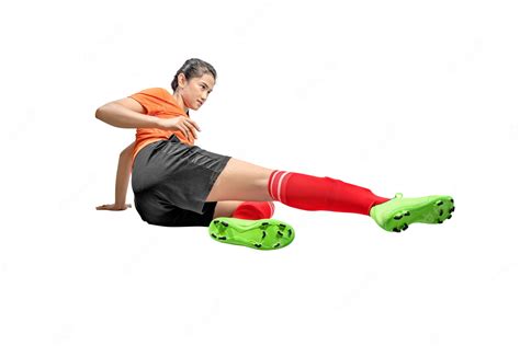 Premium Photo Asian Football Player Woman On Sliding Tackle Position