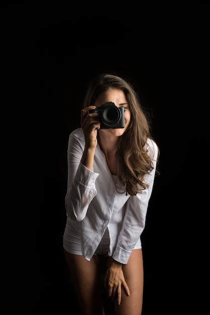 Fashion Portrait Of Young Woman Photographer With Camera Free Photo