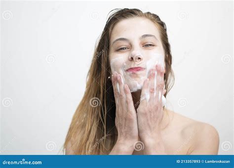 Happy Young Woman Washing Her Face With Cream Stock Image Image Of