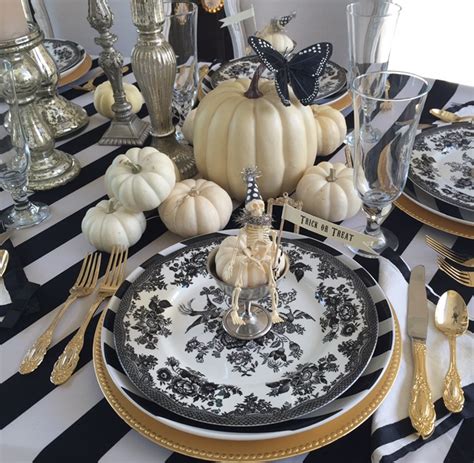 How do you decorate a halloween table without the cliche halloween decor? How to Set an Elegant Halloween Table - Randi Garrett Design