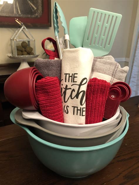 We may earn commission from the links on this page. Kitchen themed gift basket with mixing bowls, towels ...