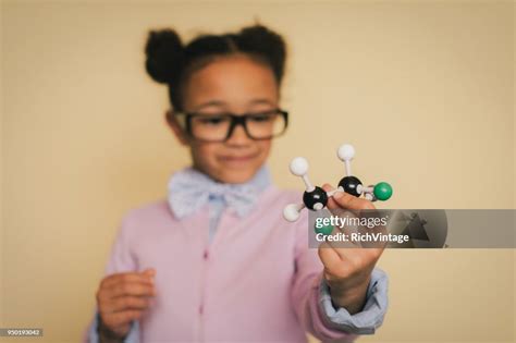 Young Nerd Girl Holding Molecular Model High Res Stock Photo Getty Images