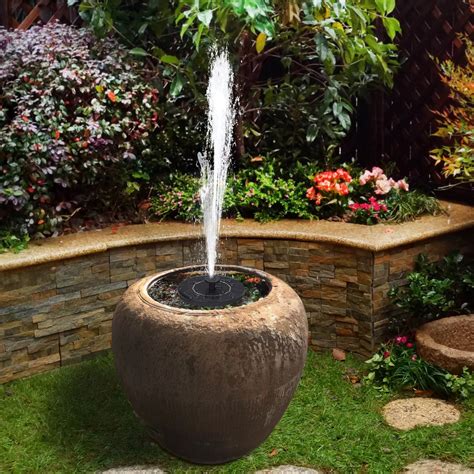 If you love the sound of trickling water, but don't have a ton of space to include an oversized fountain in your garden, a flower pot water feature like this works perfectly in small spaces. 6V 1W Solar Powered Fountain Solar DIY Fountain Pump ...
