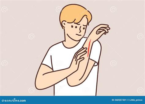 Man Examines Hand with Deep Cut or Wound Received after Accident at