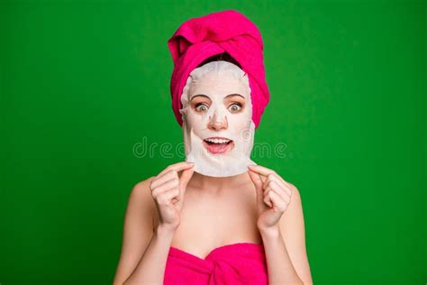 close up portrait of lovely cheery lady wearing turban removing facial mask lift uplift effect