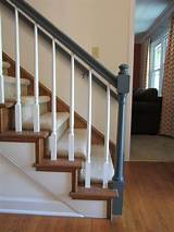 Painting stair hand rails black. The Amberican Dream: Banister Beautification