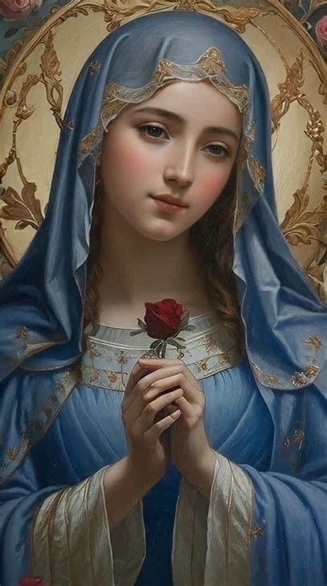 A Painting Of The Virgin Mary Holding A Rose In Her Hands And Wearing A Blue Veil