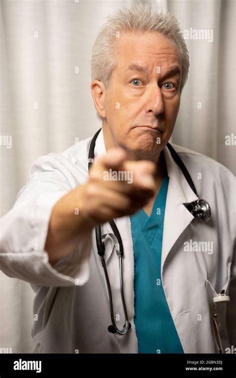 Photo Of A Doctor Pointing His Finger At You Stock Photo Alamy