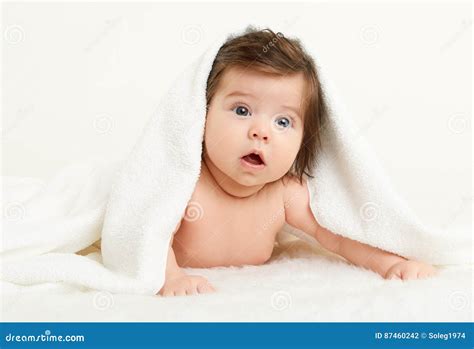 Adorably Baby Lie On White Towel In Bed Happy Childhood And Healthcare