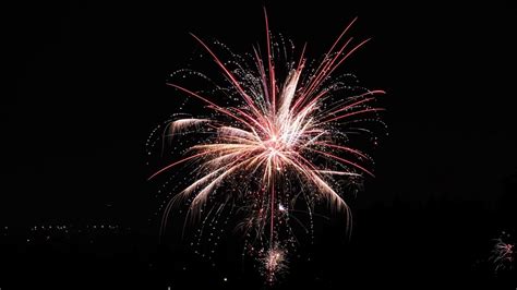 Download Wallpaper 1366x768 Fireworks Sparks Holiday Night Dark