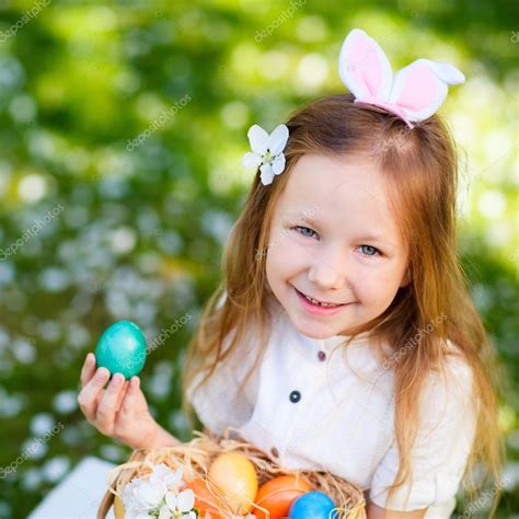 Little Girl Playing With Easter Eggs Stock Photo By ©shalamov 62634459