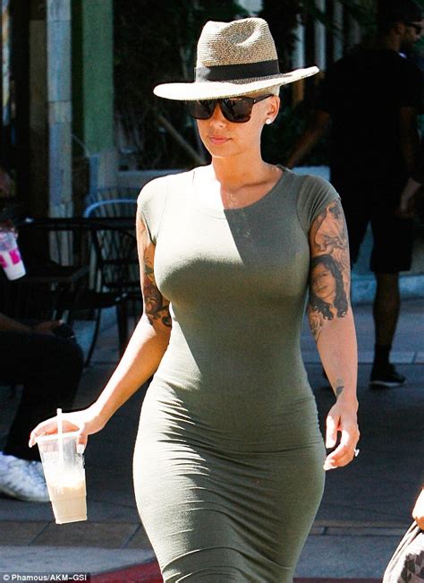 Amber Rose Shows Off Her Incredible Figure In Skin Tight Dress Daily