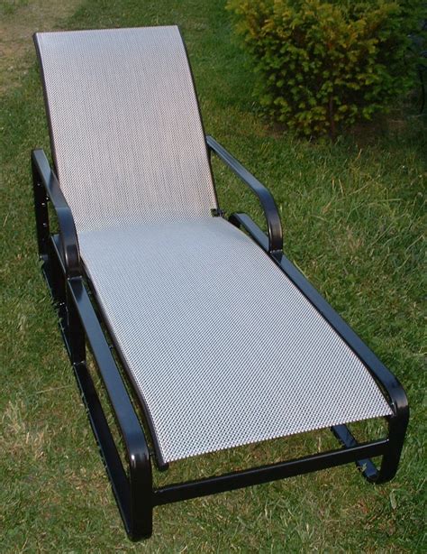 An outdoor sling chair consists of a aluminum patio chair or chaise frame, with a panel of outdoor sling mesh material stretched tight on the outdoor furniture frame. Patio Chair Sling Replacement Material