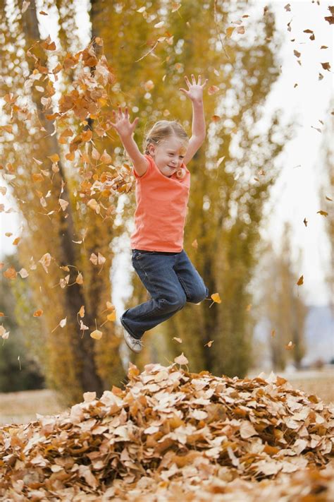 Fun Fall Activities Jump In A Big Pile Of Leaves Make Raking Less Of