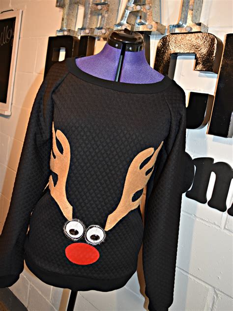 This diy sweatshirt makeover is an easy, inexpensive way to upscale a plain jacket with pretty supplies used in this diy sweatshirt makeover. DIY Reindeer Sweatshirt | WeAllSew